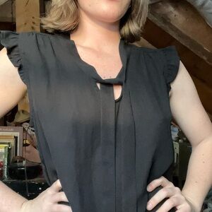 Black sleeveless top